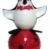Melrose 11" Playful Glittered Black And White Penguin Standing On Large Red Jingle Bell Christmas Table Top