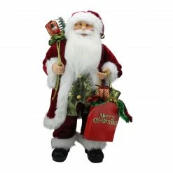 Northlight 24" Poinsettia Santa Claus With Gift Bag Christmas Figure